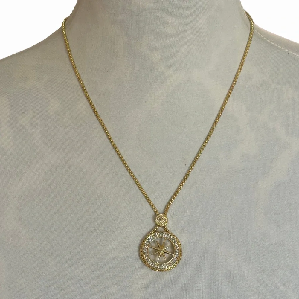 Gold Tone Compass Starburst Pendant Necklace with Crystal Halo